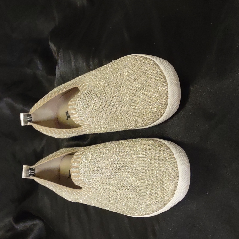 Nautica size 9.5 women's gold metallic slip on sneaker.